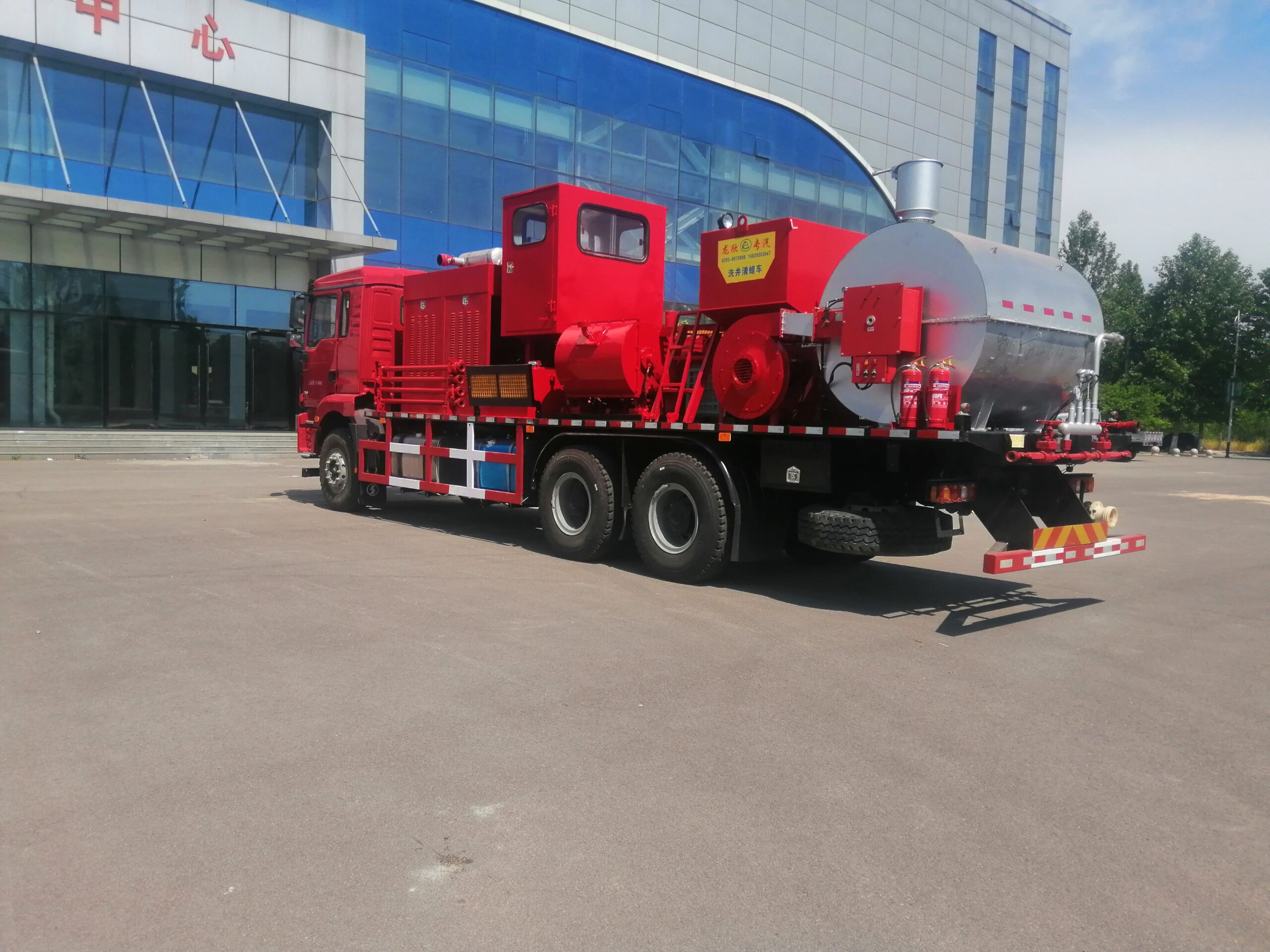 Wax removal truck for oilfield well service operations