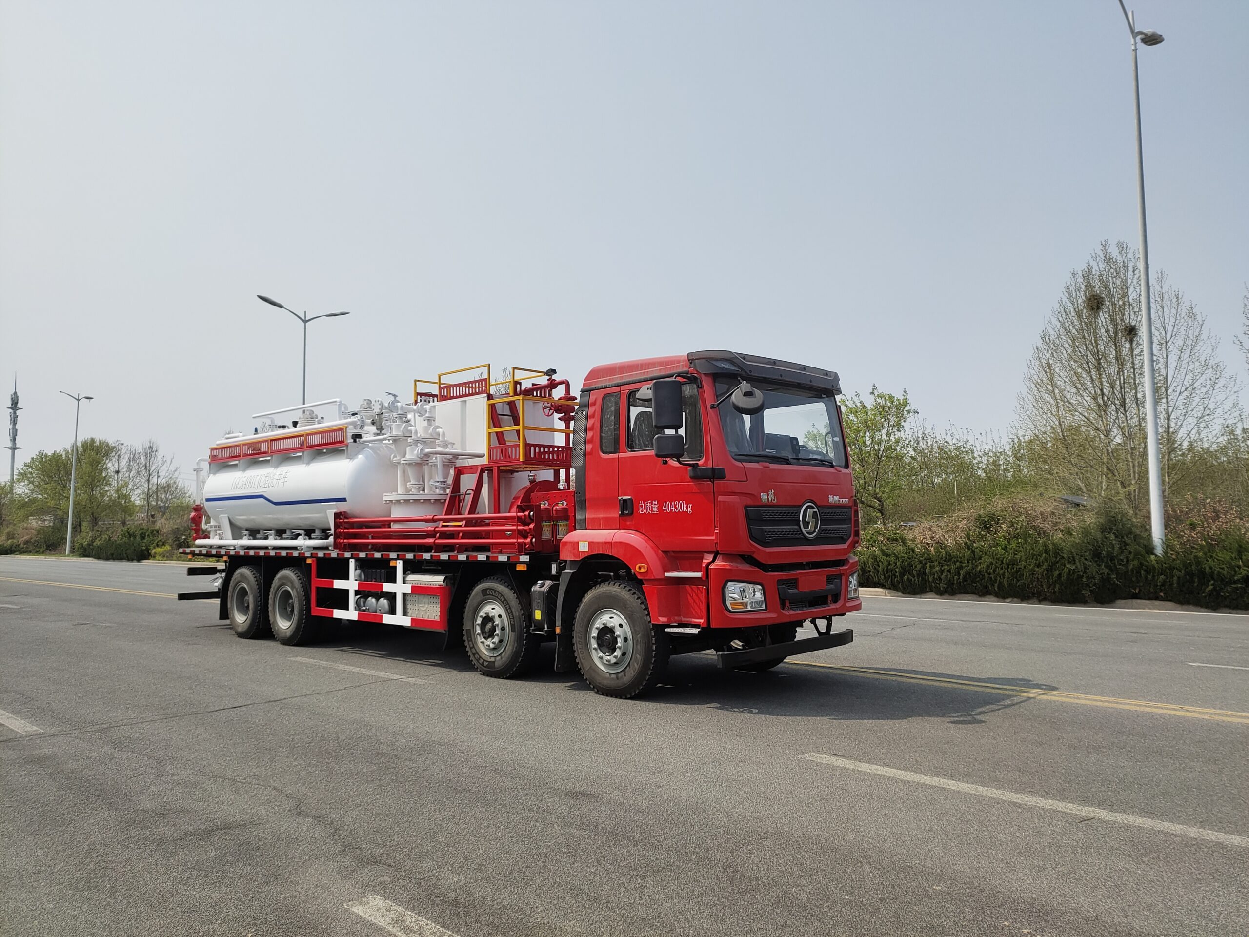 Sand flushing truck front right view — compact mobile design for oilfield operations