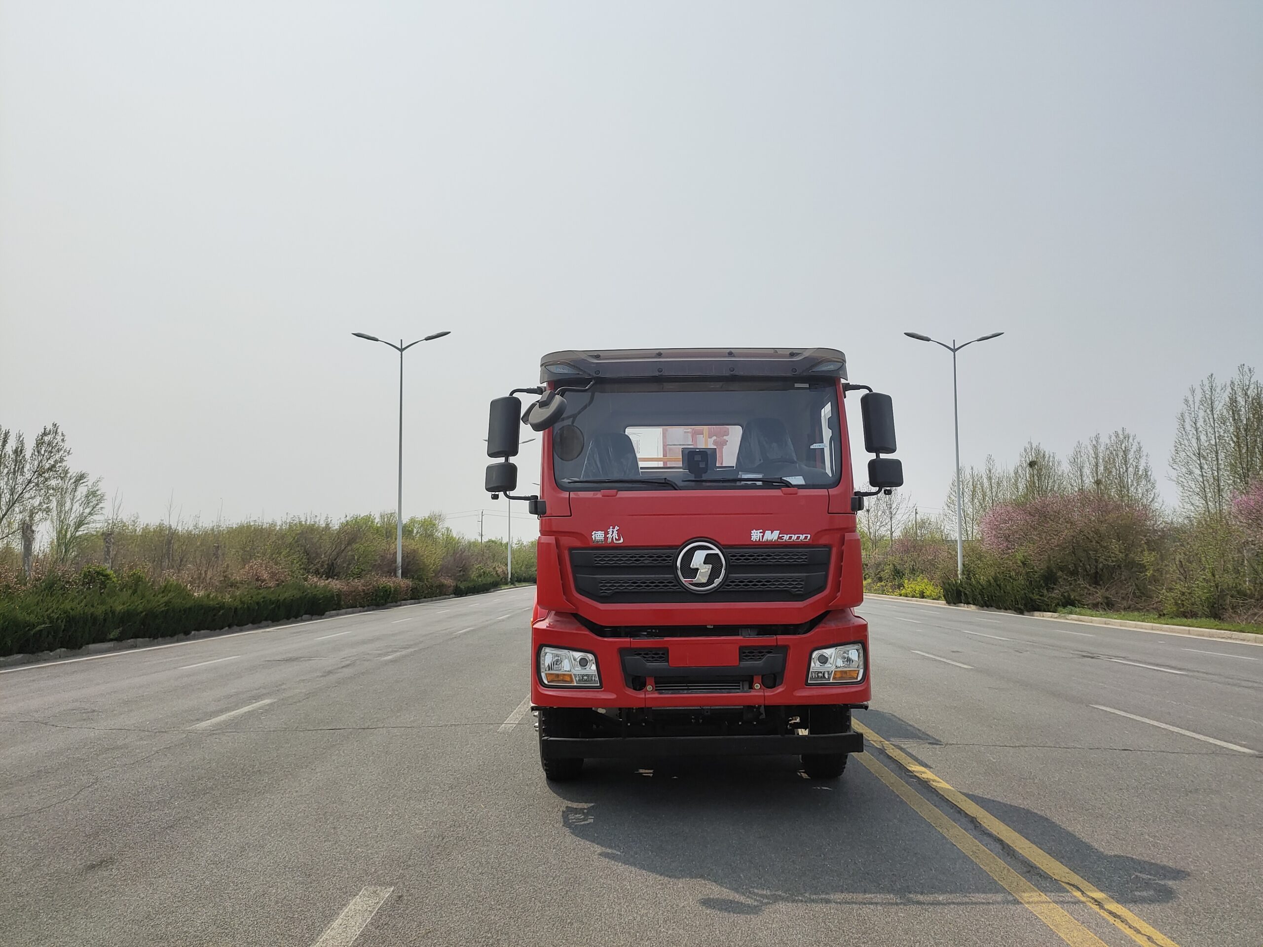Sand flushing unit direct front view — truck cab and equipment integration