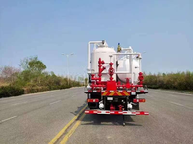 Sand flushing unit direct rear view — discharge ports and rear platform